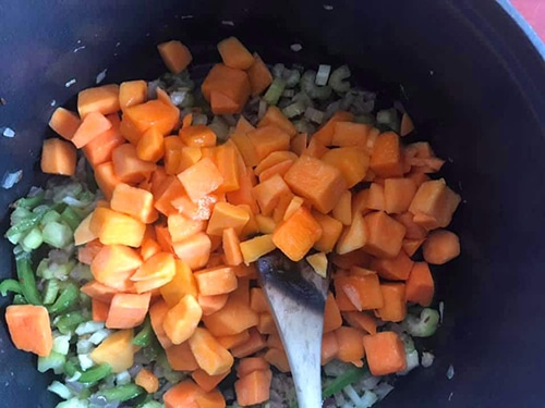 chopped butternut squash added to the pan