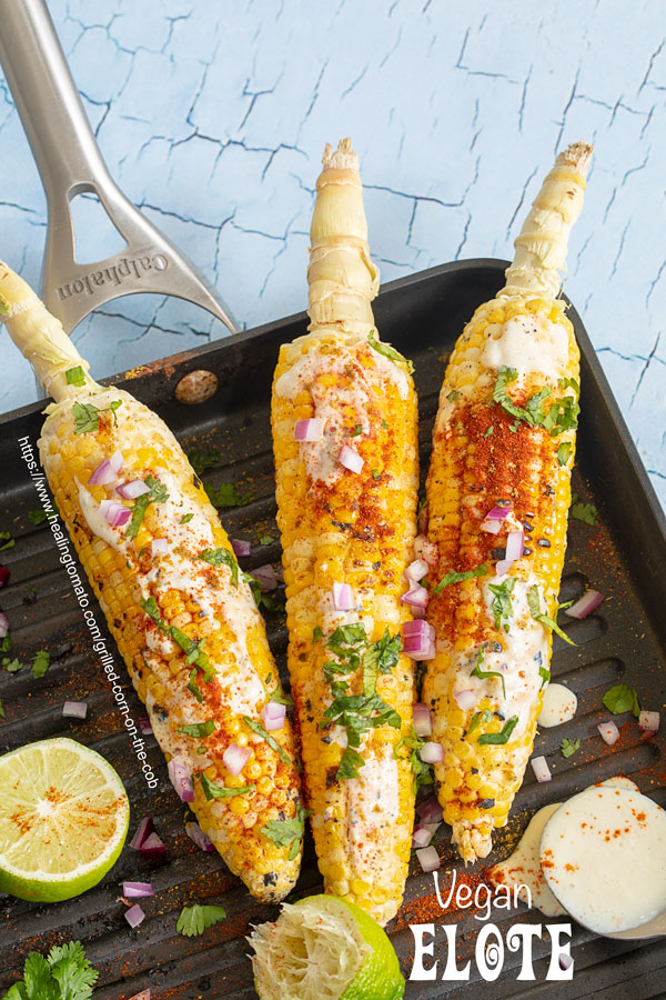 Top view of 3 grilled corn on the cob on a calphalon stove top grill