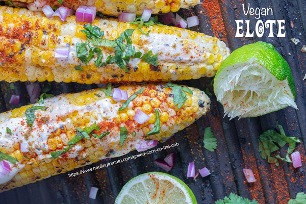 top and closeup view of grilled corn on the cob with used lime on the side