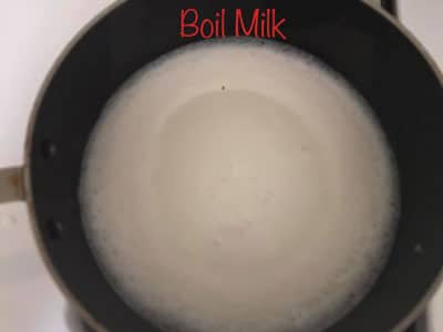 Milk boiling in a suacepan