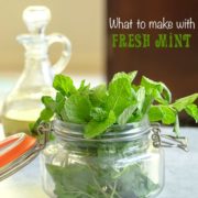 Front view of a mason jar filled with fresh mint