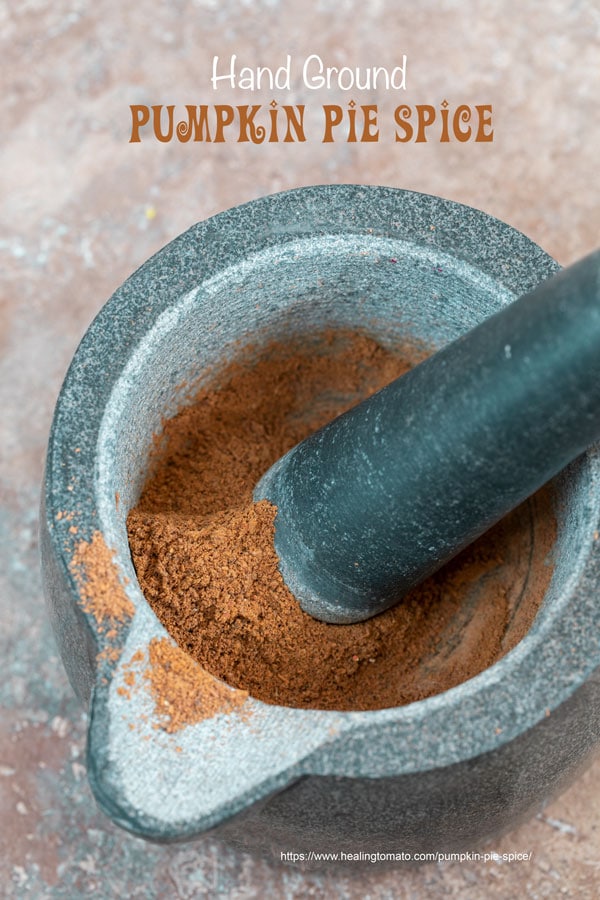 closeup view of ground pumpkin pie spice in a mortar and pestle