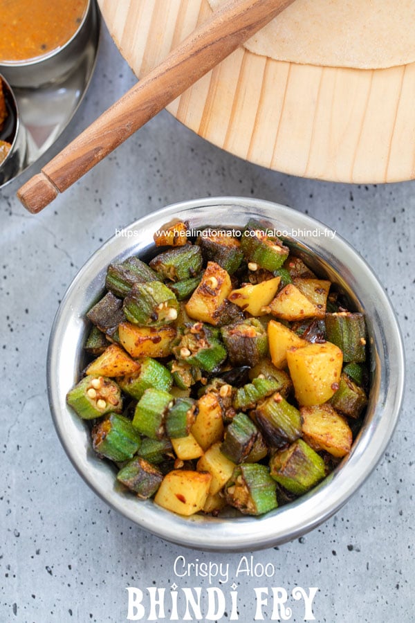 Top view of okra and potatoes in a bowl