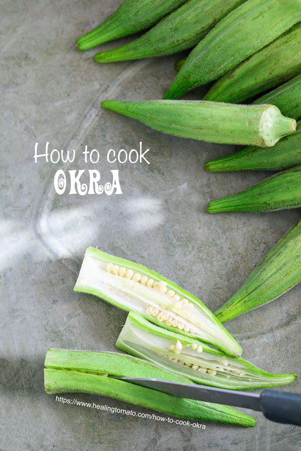 Top view of okra being sliced into lengthwise and 2 slices of cut okra on the side