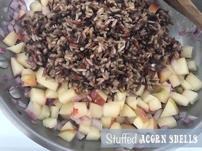 coooked wild rice added to the pan with apples and onions