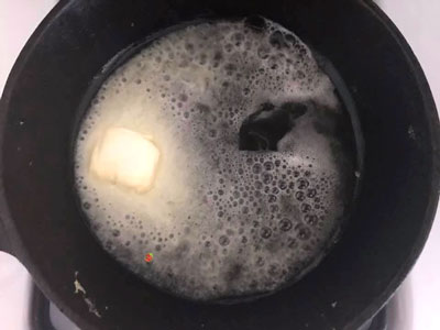vegan butter melting in cast iron pan