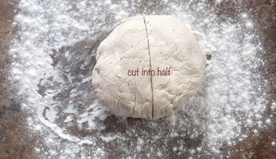 a dough of pie crust cut into half