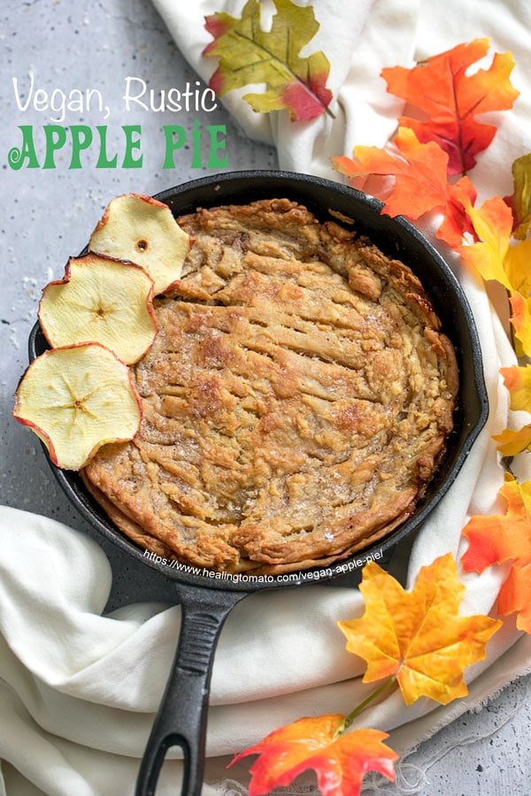 top view of a baked apple pie in a cast iron pan