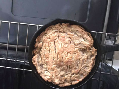 baked apple pie out of the oven