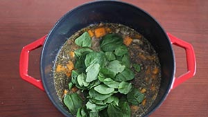 spinach added to the dutch oven