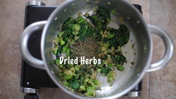 dried herbs added to pan