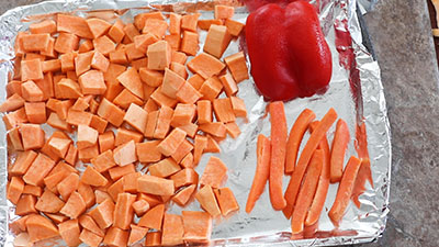 8 carrot sticks placed on the baking tray