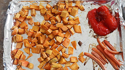 The vegetables shown in the tray after being oven-roasted