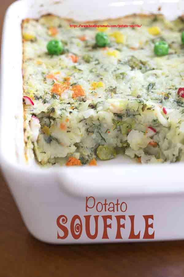 front and closeup view of a section of the potato souffle in a white baking dish