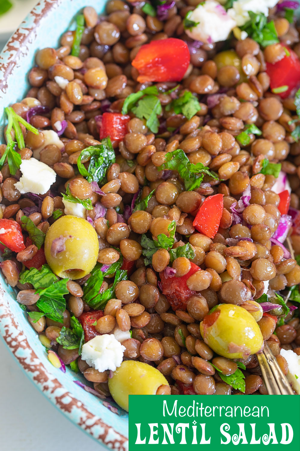 Closeup view of lentil salad in a light blue bowl