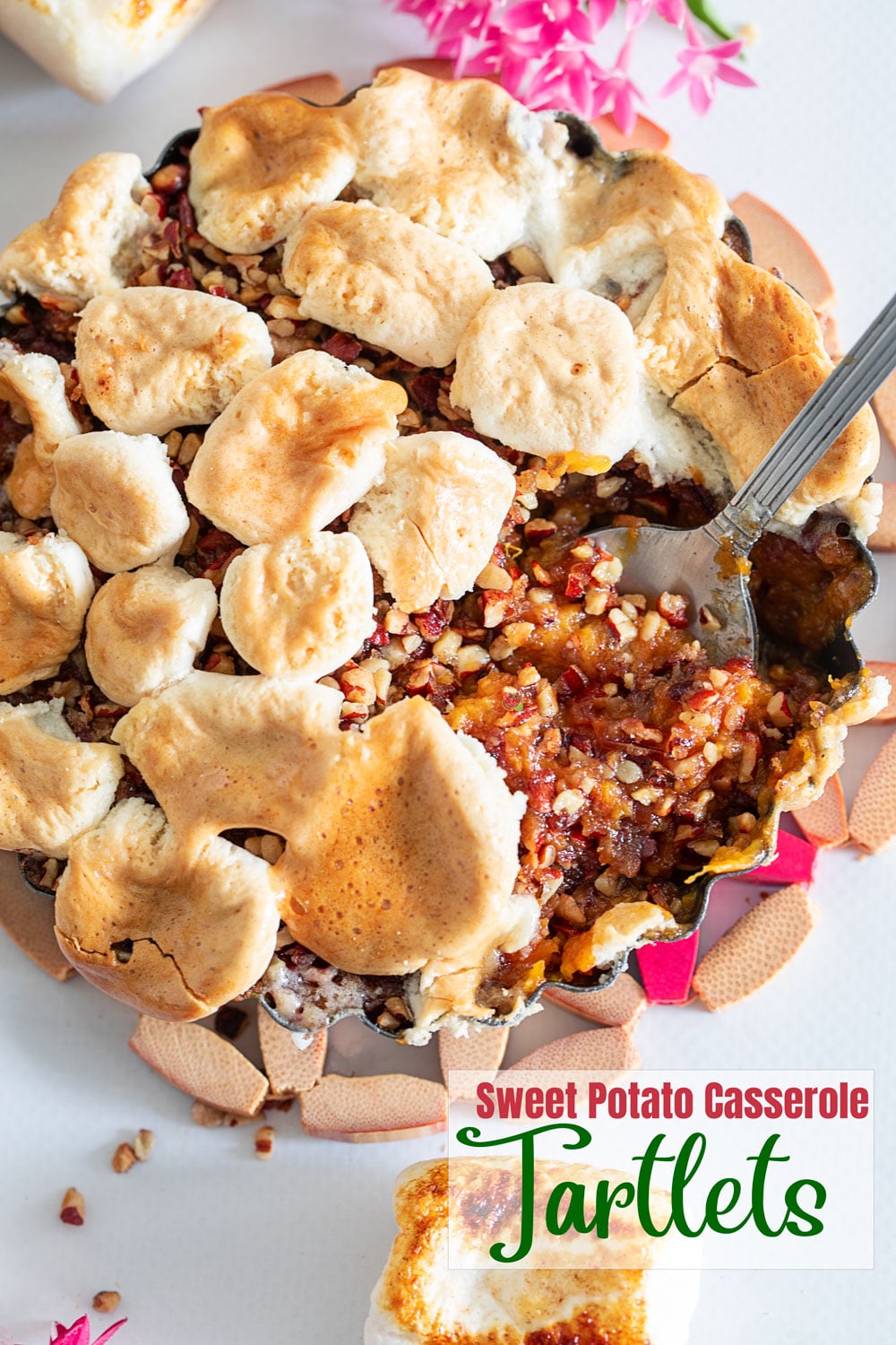 Top and closeup view of the vegan sweet potato casserole tartlet with a spoon in it showing the insides