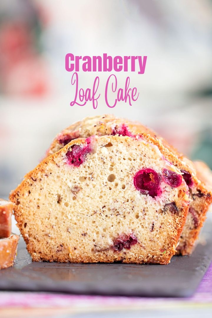 Front and closeup view of an upright slice of cranberry loaf cake