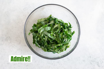 top view of the chopped greens in a glass bowl
