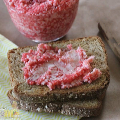 Top view of strawberry butter on wheat bread