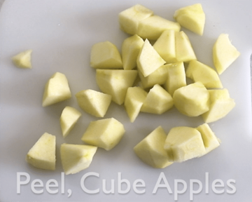 The apple is peeled and cubed