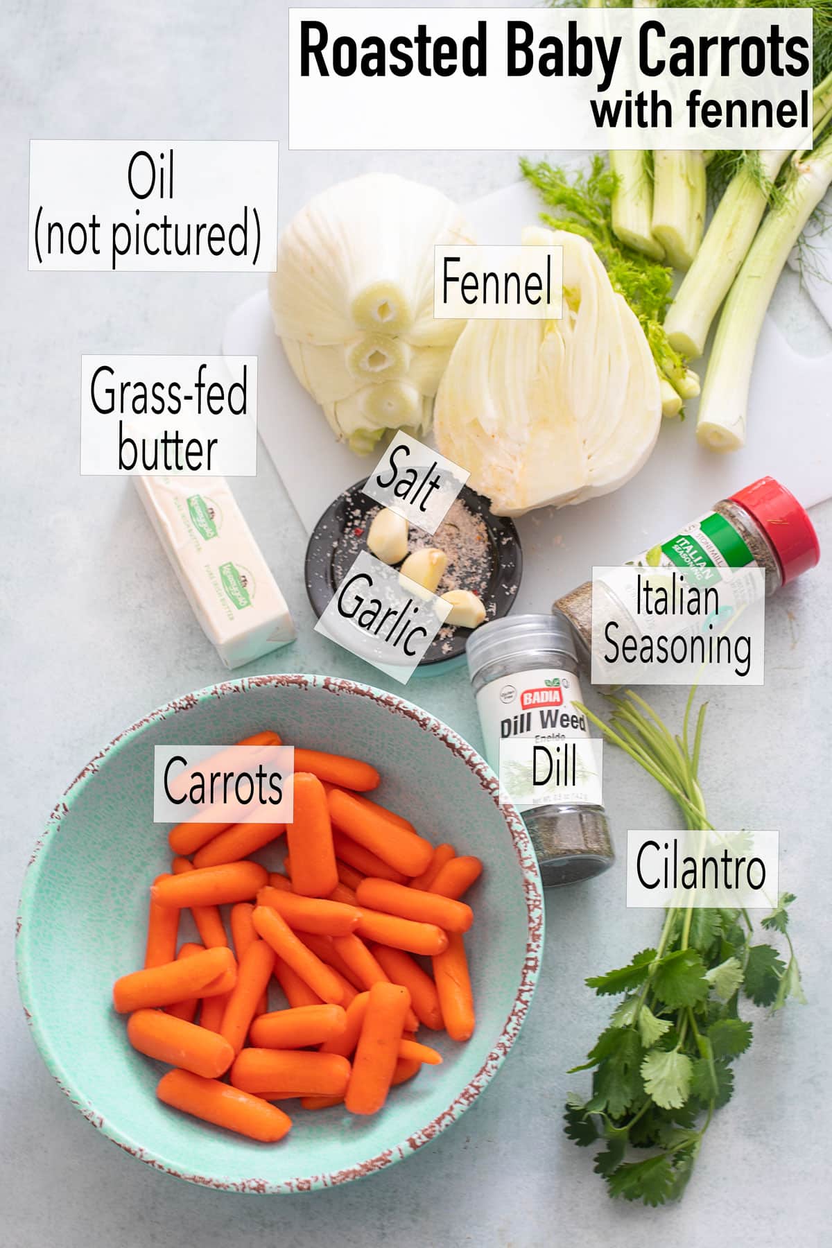 Top view of ingredients needed to make roasted baby carrots with fennel