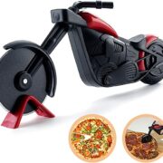 front view of a motorscycle shaped pizza cutter where the front wheel is the pizza cutter