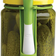 green and white detachable pickle fork attached to a pickle jar. - foodie geek gift guide