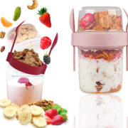 Front view of a pink and clear plastic container with 3 layers for storing yogurt, toppings.