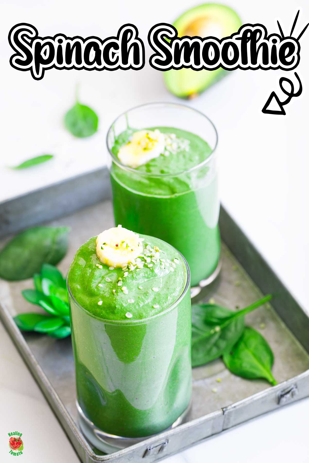 Top and angle view of a glass filled with green smoothie. A second glass is in the background too.