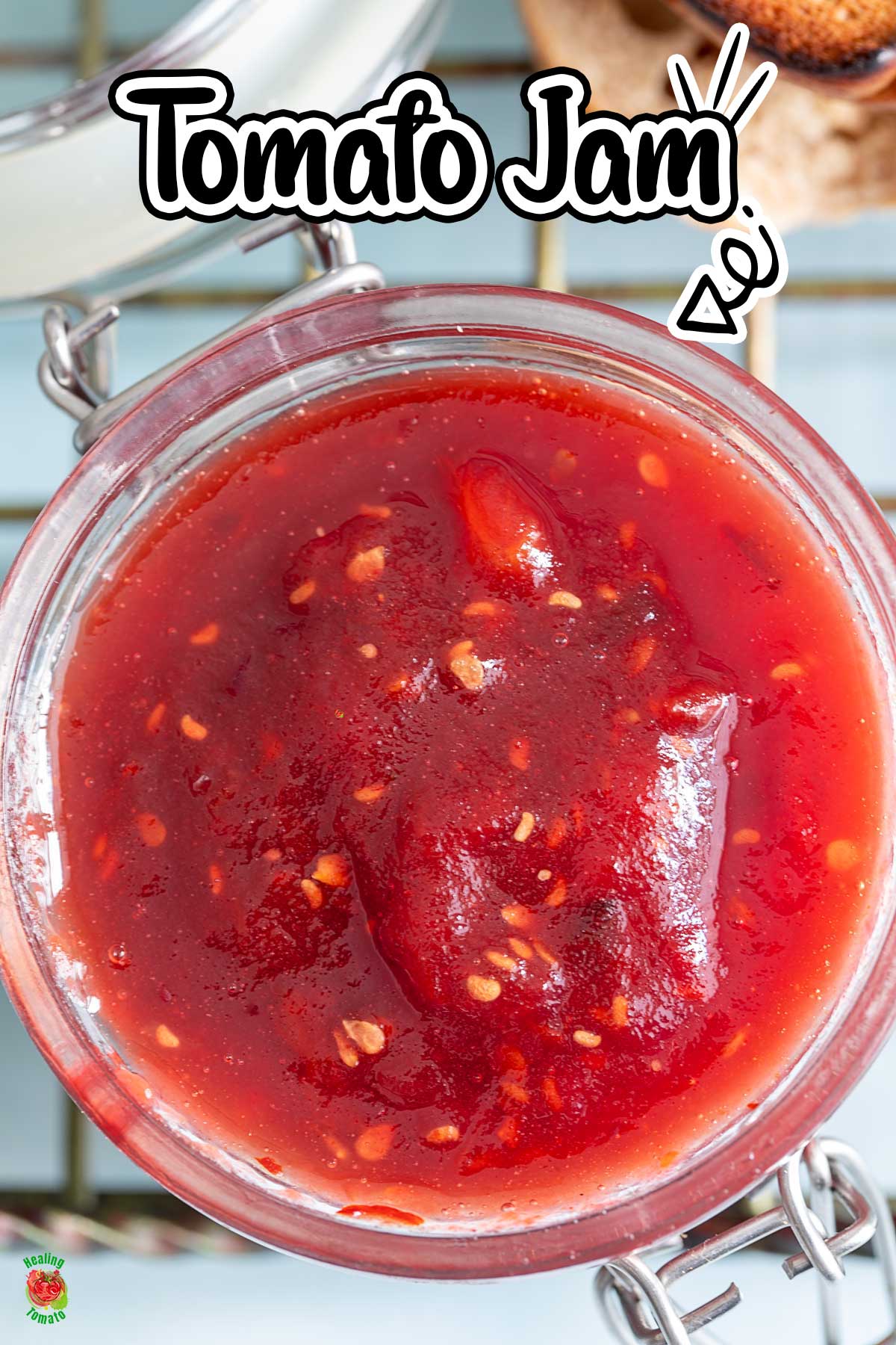 Top and closeup view of tomato jam in a glass jar