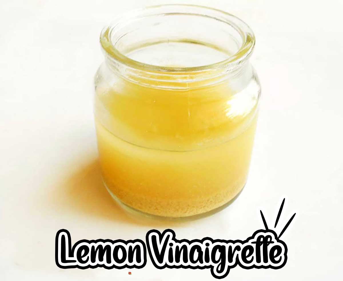 Front View of simple lemon vinaigrette in a small glass jar. Savory lemon recipes