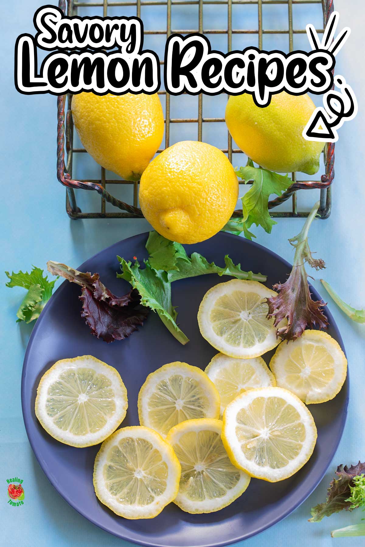 Top view of lemon slices on a blue plate. Above the plate, there is a wire rack with 3 whole lemons in it. Savory lemon recipes