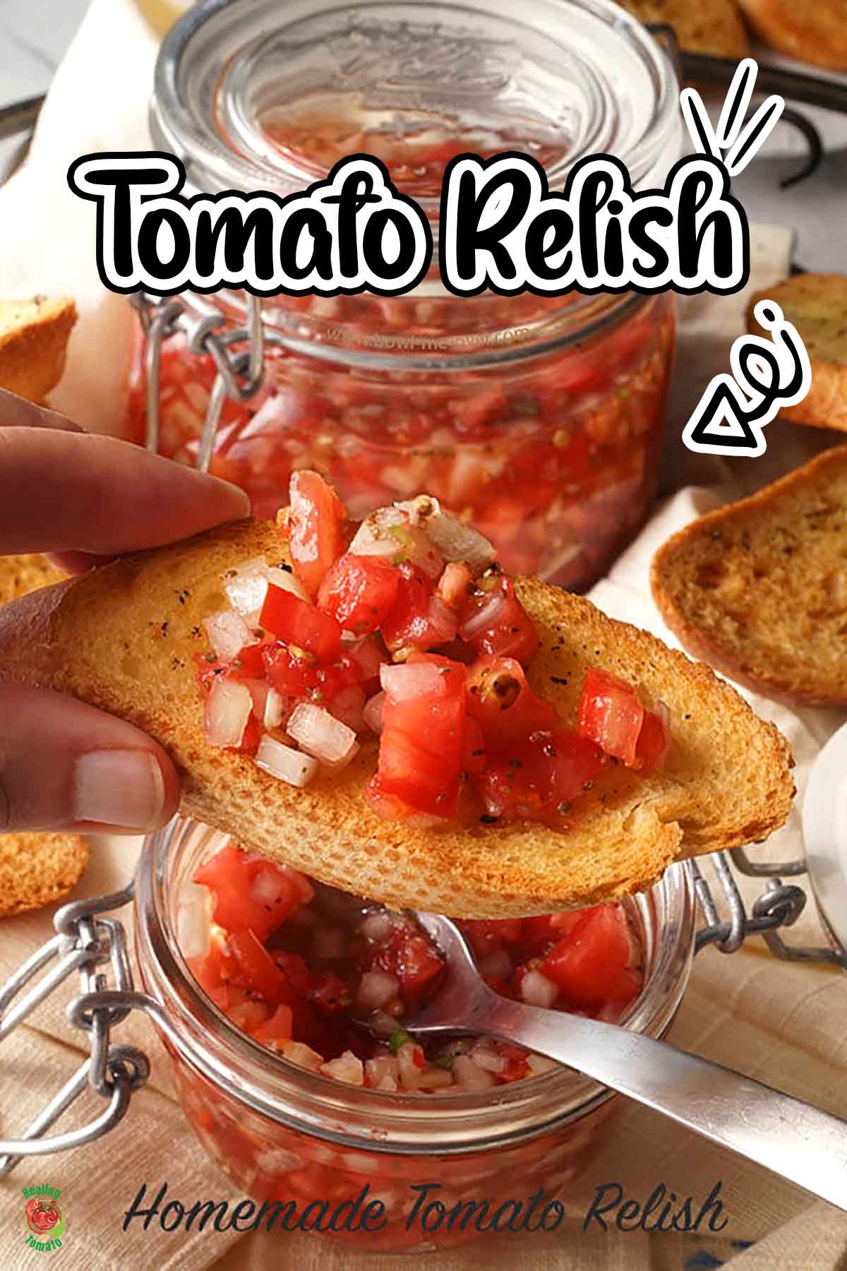 Top view of a piece of bread being held up by the author. Bread topped with tomato relish