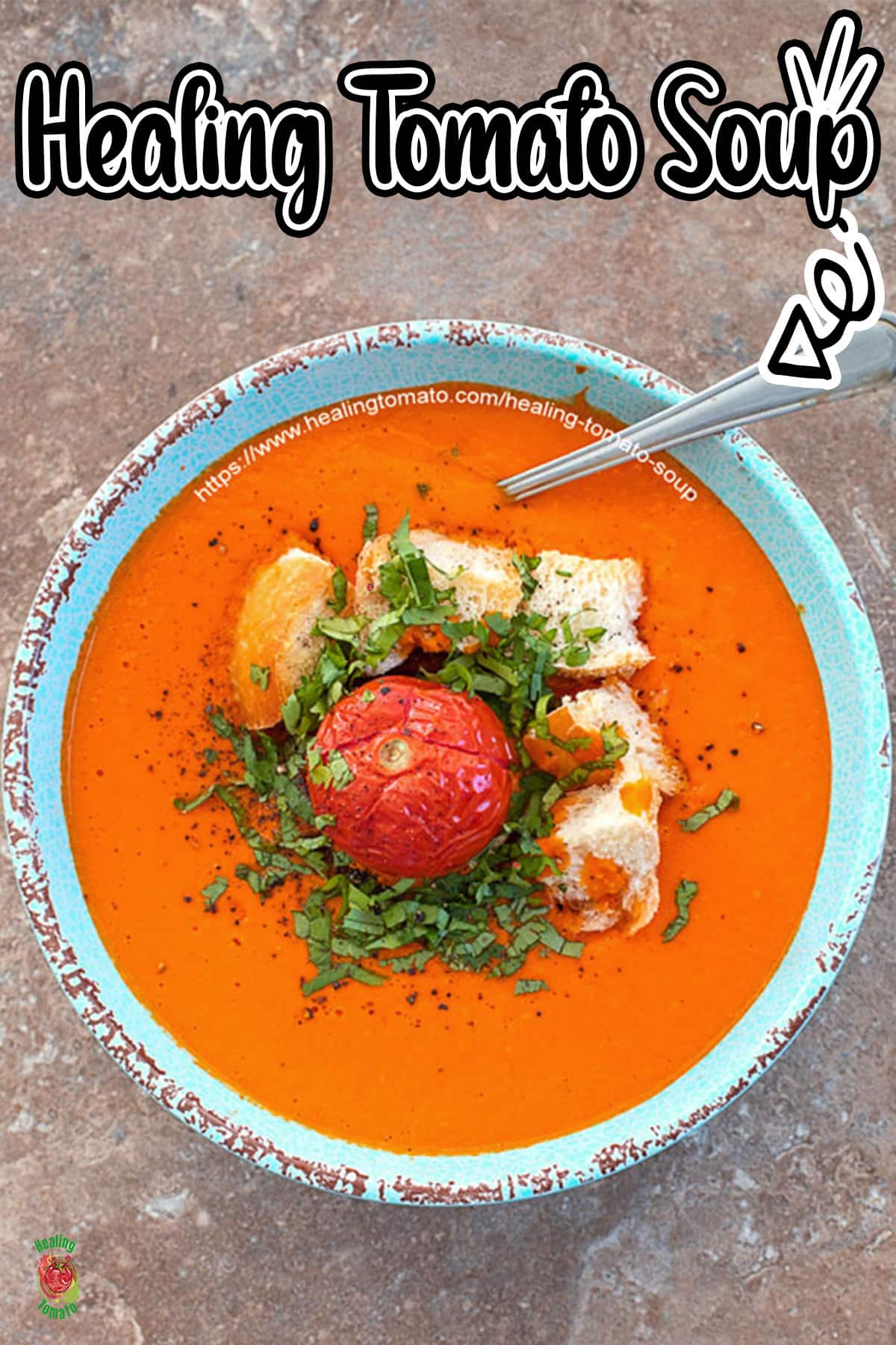 top view of a blue bowl filled with campari tomato soup