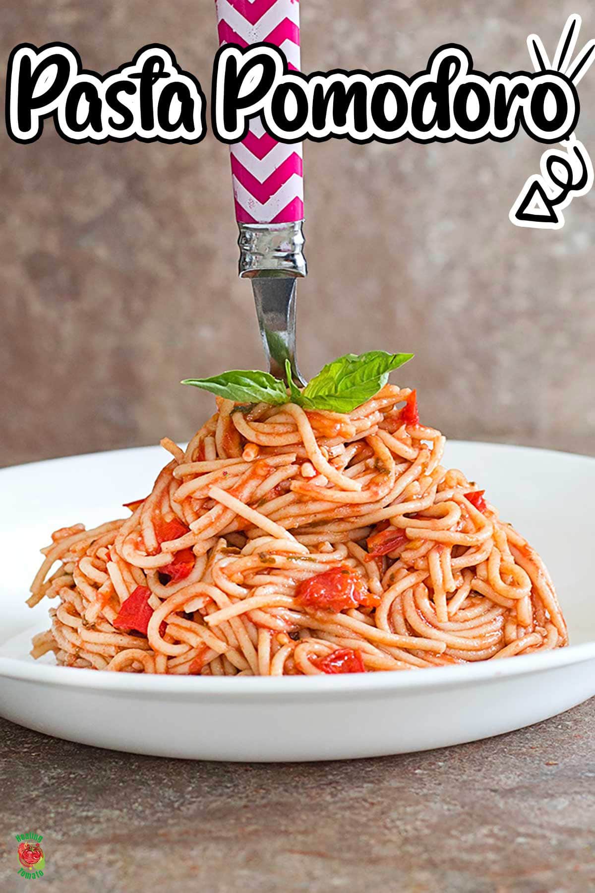 Front and closeup view of a dome of spaghetti on a white plate. A fork jutting out of the top of the dome