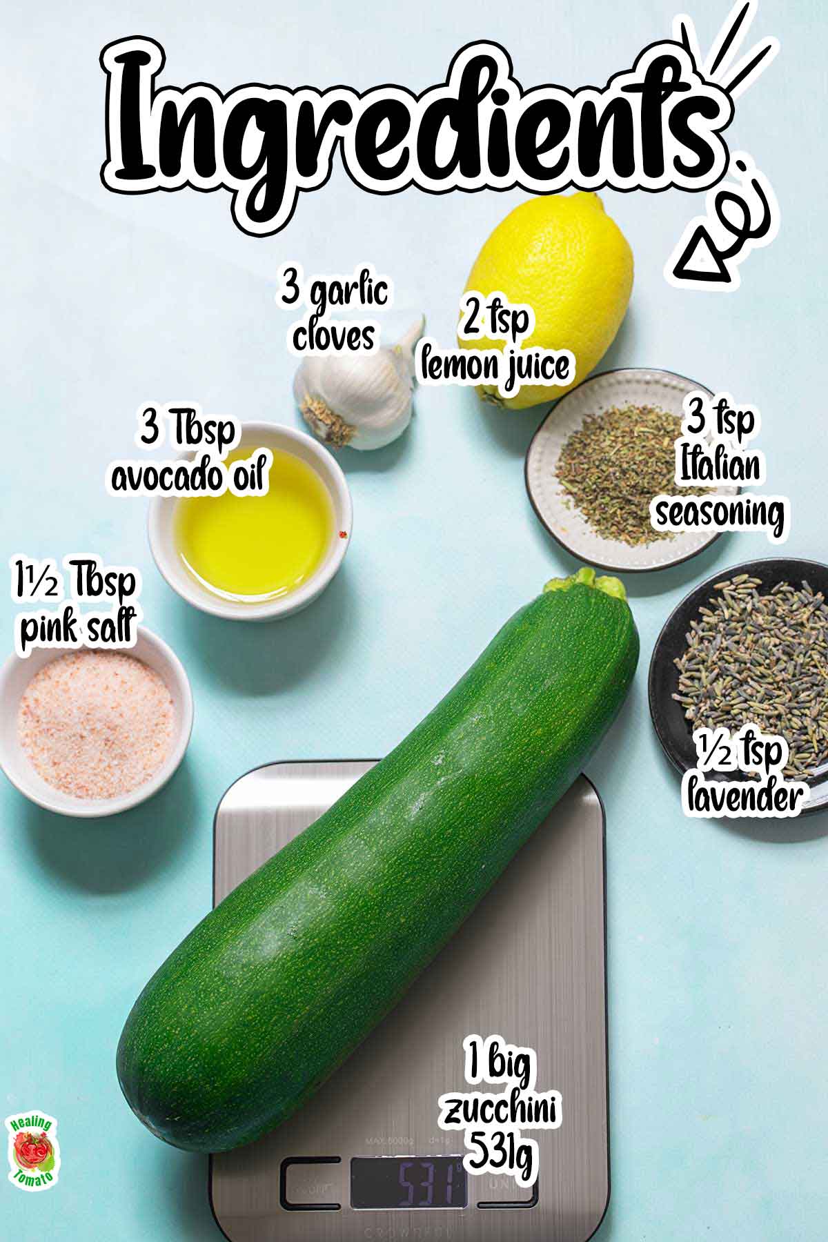 The ingredients needed to make roasted zucchini laid out on a blue background