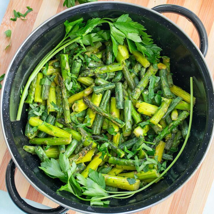 Top and closeup view of veggies in a black pan