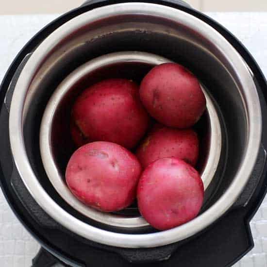 Top view of red potatoes inside an Instant Pot.